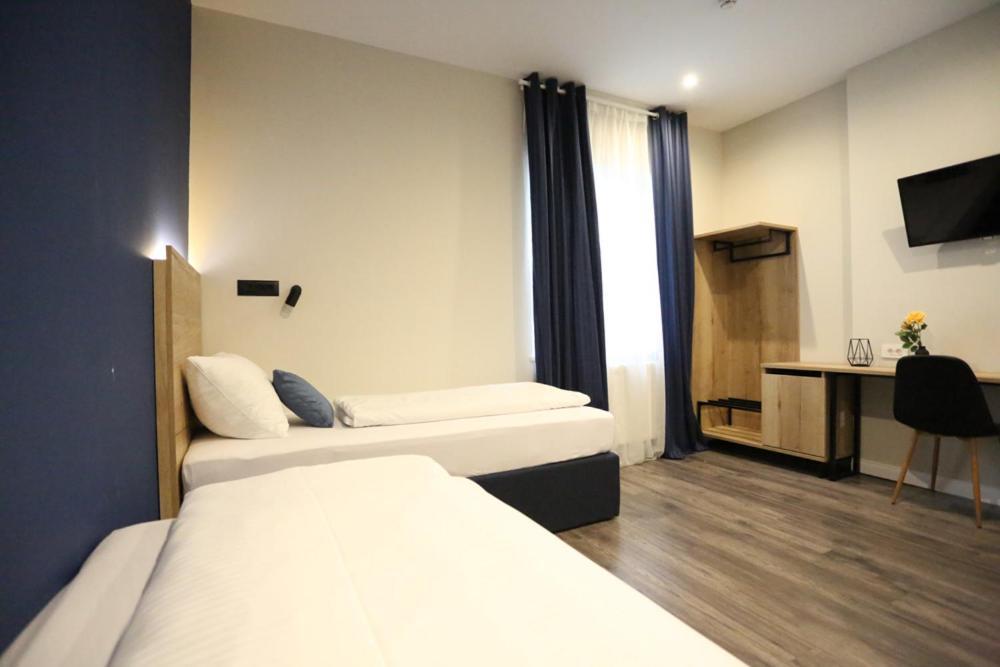 Tweepersoonskamer met 2 Aparte Bedden