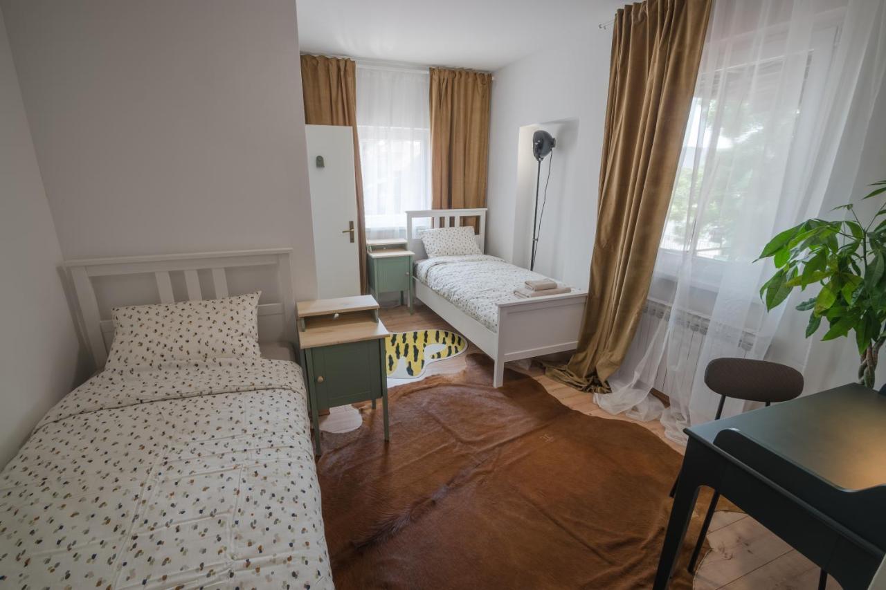 Tweepersoonskamer met 2 Aparte Bedden